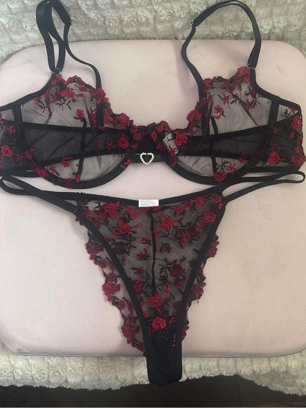 Black and red transparent rose lace bra and thong with heart detail